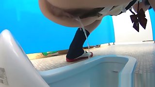 Japanese babes pee attend to a enter filmed doing tingle in the bathroom